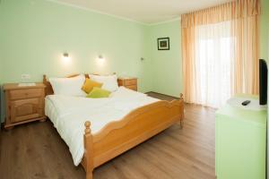 Posteľ alebo postele v izbe v ubytovaní Villa Vinka + 37 fotografií