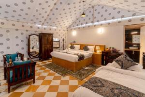 Postel nebo postele na pokoji v ubytování Golden Star Desert Camps & Resort + 54 fotografií