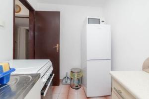 Kuchyňa alebo kuchynka v ubytovaní Apartment Matejuška