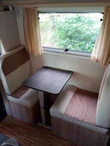 Χώρος καθιστικού στο Nuit insolite en camping-car tout confort