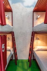 Postel nebo postele na pokoji v ubytování Blanco Albergue
