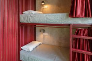 Postel nebo postele na pokoji v ubytování Blanco Albergue
