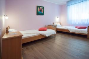 Posteľ alebo postele v izbe v ubytovaní Villa Vinka