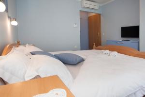 Posteľ alebo postele v izbe v ubytovaní Villa Vinka