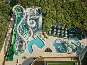 an overhead view of a water park with a water slide at Paloma Grida in Belek +112 photos