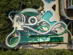 an aerial view of a water slide at a water park at Paloma Grida in Belek