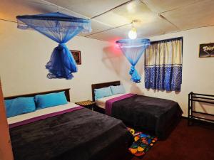 Postel nebo postele na pokoji v ubytování Misty Soul Retreat