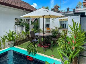 Πισίνα στο ή κοντά στο Creative 1BR mezzanine Loft with shared Pool, Gym and private Kitchen in Canggu