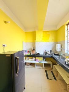 Η κουζίνα ή μικρή κουζίνα στο Elegant homestay