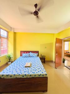 Ένα ή περισσότερα κρεβάτια σε δωμάτιο στο Elegant homestay