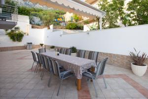Patio alebo iná vonkajšia časť ubytovania Villa Vinka