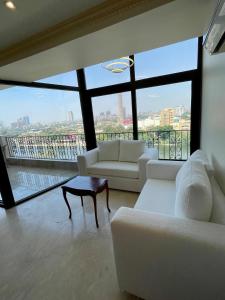 Χώρος καθιστικού στο Luxury apartment Nile view