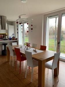 a dining room table and chairs in a kitchen at Lo Spazio dell'Anima 