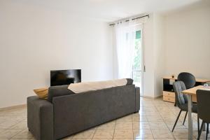 TV a/nebo společenská místnost v ubytování Inn Pisa Rentals - Urban style Pisa Flat