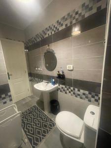 Ένα μπάνιο στο Cozy apartment with in agora in front of marrasi