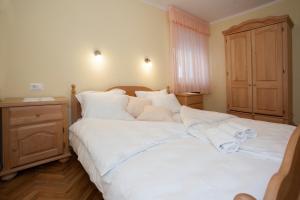 Posteľ alebo postele v izbe v ubytovaní Villa Vinka