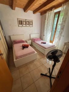 Postel nebo postele na pokoji v ubytování La casa di Agnese by Homes in Ancona