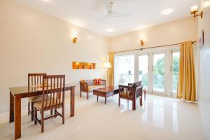 Posezení v ubytování Bougainvillea Suites 1 - 2 BHK Apartment