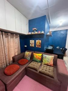 Posezení v ubytování The Blue Room Legazpi City