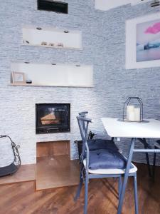 Et tv og/eller underholdning på Apartamenty Biały Kamień