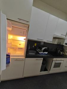 Kuchyň nebo kuchyňský kout v ubytování ABAI Dormitory + 1 fotografie