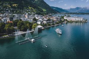an aerial view of a town on a lake at Old Town City Center Apartment Post in Zell am See