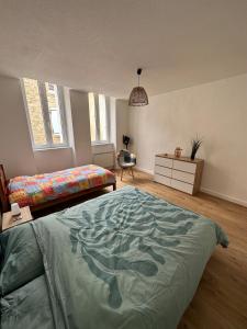 Voodi või voodid majutusasutuse Appartement T2 avec Grande Terasse toas