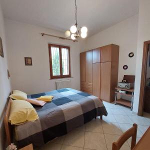 Ένα ή περισσότερα κρεβάτια σε δωμάτιο στο La Casa di Rina +17 φωτογραφίες