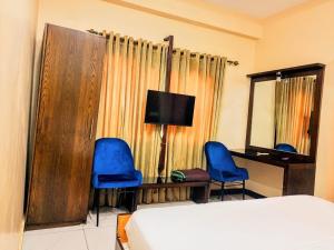 Televisyen dan/atau pusat hiburan di Hotel Rosewood