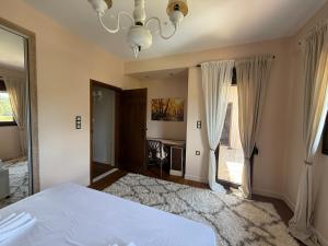 Ένα ή περισσότερα κρεβάτια σε δωμάτιο στο Vytina Mont et Sapin