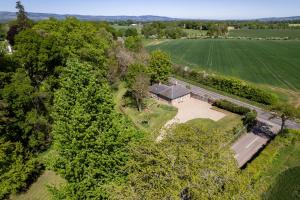 an overhead view of a house in a field at Newtonmill - Tranquillity in Rural Angus in Edzell