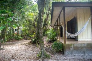 Zahrada ubytování Casa charmosa e pé na areia na Ilha do Mel - Nova Brasília