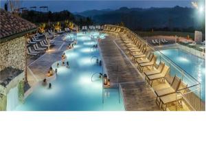 an overhead view of a swimming pool at a resort at Alle Terme B&B in Rapolano Terme