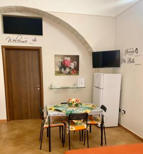 TV a/nebo společenská místnost v ubytování Casa della Gioia