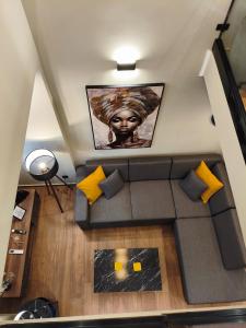an overhead view of a living room with a couch at NK Loft in Alexandroupoli