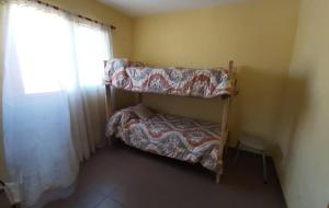 Ένα ή περισσότερα κρεβάτια σε δωμάτιο στο Casa de La Punta