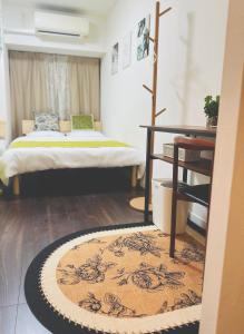 Una cama o camas en una habitación de Shinjuku city西新宿