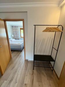 Ένα ή περισσότερα κρεβάτια σε δωμάτιο στο Ferienhaus Schmetterling