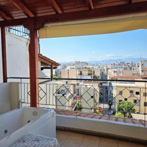 Balkón nebo terasa v ubytování Acropolis View Sky Suite with Jacuzzi near Metro