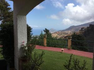 a balcony with a view of the mountains at Villa Eleanto in Cefalù