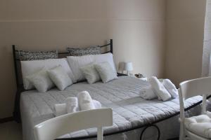 A bed or beds in a room at Domus Tua