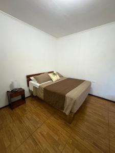 Postel nebo postele na pokoji v ubytování Pumakari Rapa Nui