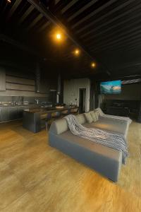 a large bed in a room with a television at Casa Vilas Boas Macacos in Nova Lima +35 photos