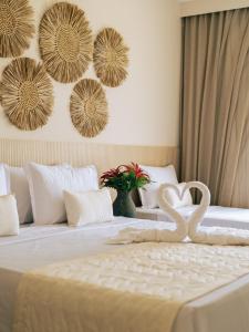 Ένα ή περισσότερα κρεβάτια σε δωμάτιο στο Pipa Privilege Ocean +16 φωτογραφίες