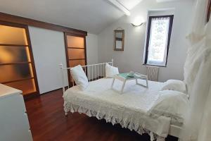 Ένα ή περισσότερα κρεβάτια σε δωμάτιο στο Casa Bareggio +6 φωτογραφίες