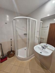 a bathroom with a shower and a sink at Cozy studio 125 in Villa Park in Borovets