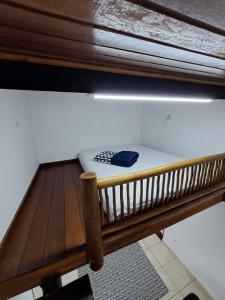 Ένα ή περισσότερα κρεβάτια σε δωμάτιο στο Casinha ilha