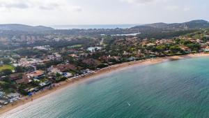 an aerial view of a beach with a group of people at Buzios VIP in Búzios
