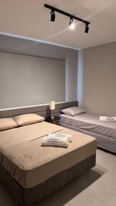 Postel nebo postele na pokoji v ubytování Apartamento Novo e Confortável em Cabo Frio