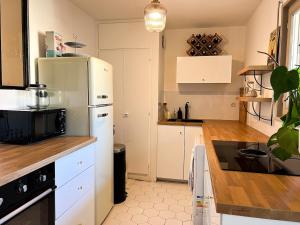 Kuchyň nebo kuchyňský kout v ubytování Le Cocon Saint Florent + 7 fotografií